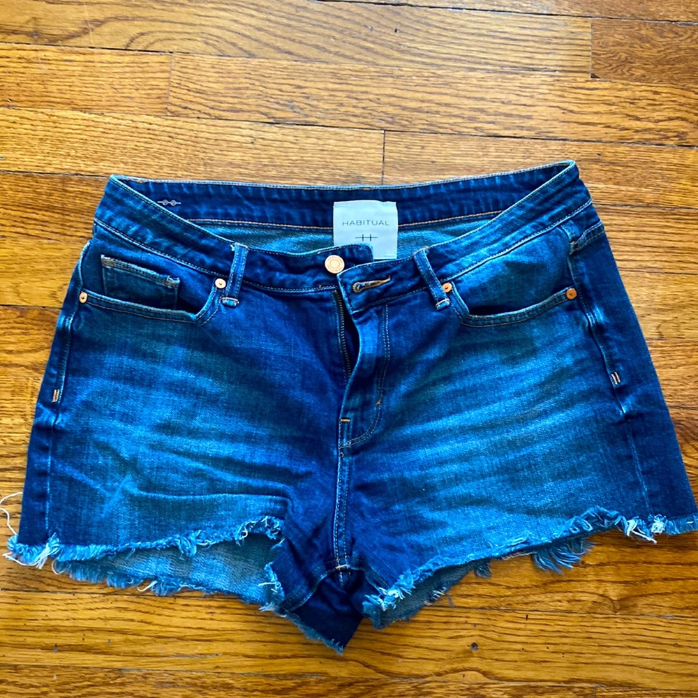 Habitual size 29 cut off Jean shorts.  Medium blue color, frayed edges.